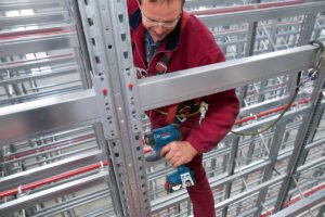 Masina de gaurit si insurubat cu 2 acumulatori Li-Ion Bosch Kit 2 scule 18V GSR 180-LI , 1.5Ah, 54Nm + GDX 180-LI Masina de insurubat cu impact, 180Nm + Valiza