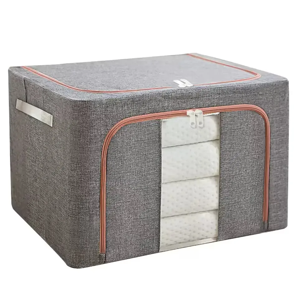 Organizator depozitare Macvi® 100 litri, cutie textila pliabila cu capac si fermoar, panou transparent pentru vizualizare si cadru metalic robust, ideala pentru haine voluminoase si depozitare